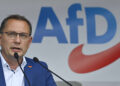 Far-right Alternative for Germany (AfD) party's co-leader and top candidate in the upcoming election, Tino Chrupalla addresses a rally of the AfD party for the launch of the electoral campaign ahead of the September 26 federal elections, in Schwerin, northern Germany, on August 10, 2021. (Photo by John MACDOUGALL / AFP)